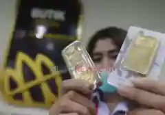 Kilau Emas Antam Meroket Jelang Akhir Pekan, Tembus Rp2,65 Juta per Gram