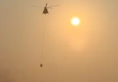Teknik Water Bombing Helikopter BNPB: Presisi Jatuhkan Ribuan Liter Air Atasi Karhutla